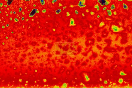 Foto de "Burbujas de pintura de colores en un vaso
" - Imagen libre de derechos