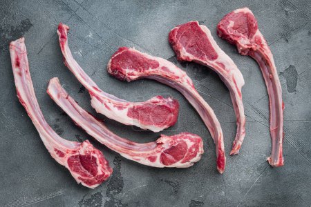 Photo for "Raw Lamb chops , on gray stone background, top view flat lay" - Royalty Free Image