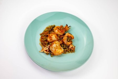 Photo for "second course with cuttlefish and tomato peas" - Royalty Free Image