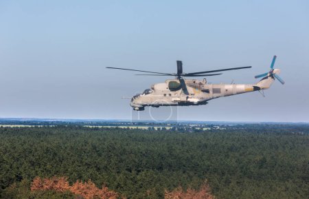 Photo for "military helicopter Mi-24 (Hind)" - Royalty Free Image