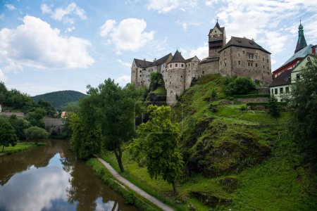 Photo for "View of Loket Castle and town in summer" - Royalty Free Image