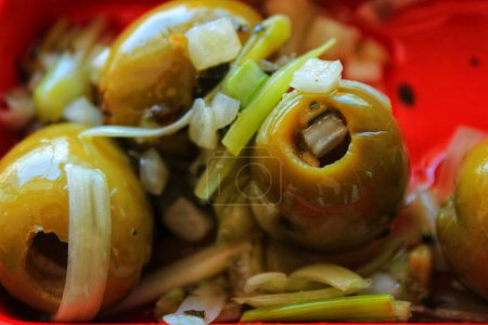 Photo for "Delicious Spanish tapa. Olives with onion, oregano and olive oil" - Royalty Free Image