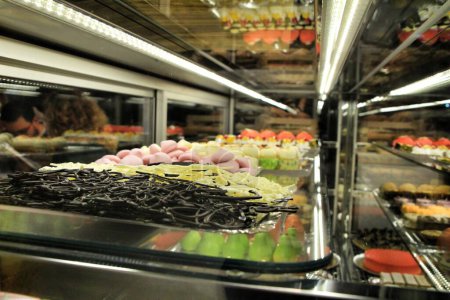 Photo for "Tray of cakes and sweets in a pastry shop" - Royalty Free Image