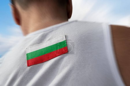 Photo for "The national flag of Bulgaria on the athlete's back" - Royalty Free Image