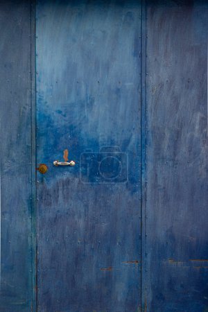 Photo for Metal of a metal door, weathered in southern Spain - Royalty Free Image