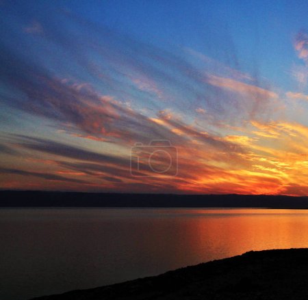 Photo for Scenic view of sunset at the seaside with mountains background, Jordan - Royalty Free Image