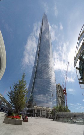 Photo for LONDON, ENGLAND- 29 June, 2017: Titl shot of The Shard on a sunny day in London - Royalty Free Image