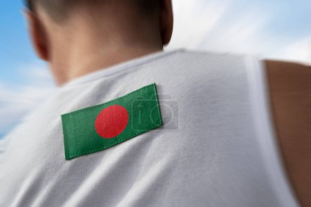Photo for The national flag of Bangladesh on the athlete's back - Royalty Free Image