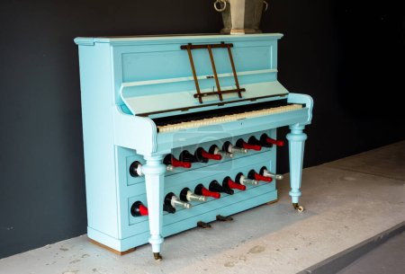 Photo for Local wine bar with piano   on background - Royalty Free Image