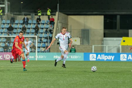 Foto de "Attila Szalai HUN en acción en el Mundial de Qatar 2022 Andorra vs Hungría" - Imagen libre de derechos