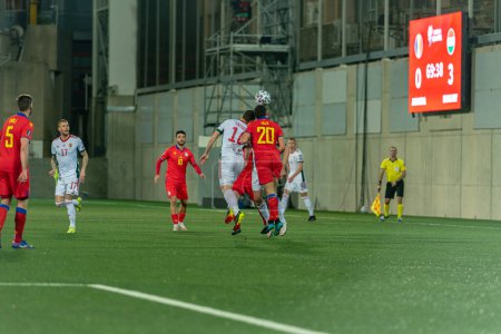 Téléchargez les photos : "Joueurs en action dans le Qatar 2022 World Cup Qualifying match Andorre vs Hongrie" - en image libre de droit