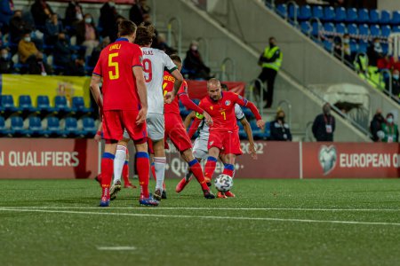 Foto de "Marc Puyol AND en acción en el Mundial de Fútbol Qatar 2022 Andorra vs Hungría" - Imagen libre de derechos