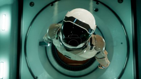 Téléchargez les photos : "Quelque part dans l'espace lointain, un astronaute plane dans son vaisseau spatial. Rendu 3D." - en image libre de droit