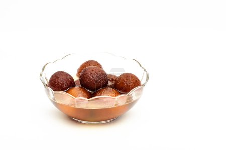 Photo for "Gulab Jamun sweets in a glass bowl" - Royalty Free Image