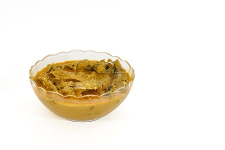 Foto de "Kerala Sardine pescado curry en un recipiente de vidrio" - Imagen libre de derechos