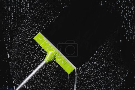 Photo for Glass cleaner black window - Royalty Free Image
