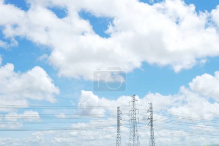 Photo for Blue sky and white cloud with high voltage transmission towers and power line - Royalty Free Image