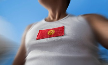 Téléchargez les photos : Le drapeau national de Kirghizia sur la poitrine de l'athlète - en image libre de droit