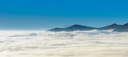 Photo for Beautiful view of white clouds with mountains, nature concept background - Royalty Free Image