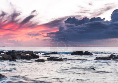 Photo for Majestic rocky shore of Indian ocean at sunset, Mauritius - Royalty Free Image