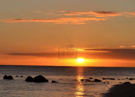 Photo for Rocky shore of Indian ocean at sunset, Mauritius - Royalty Free Image
