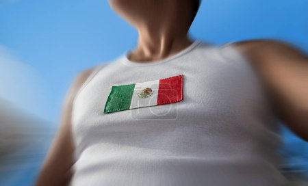 Foto de "La bandera nacional de México en el pecho del atleta" - Imagen libre de derechos