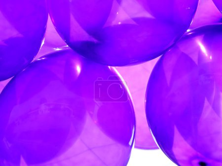 Photo for Purple party balloons background view - Royalty Free Image
