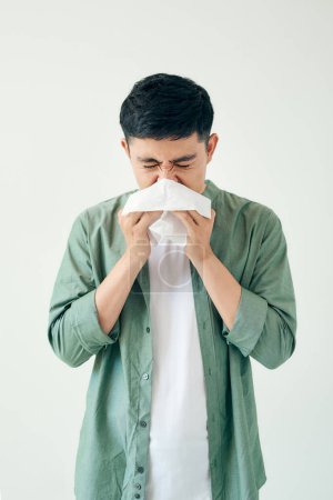 Photo for Young asian man catches a cold, illness concept - Royalty Free Image