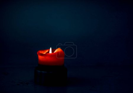 Photo for Red holiday candle on dark background, luxury branding design and decoration for Christmas, New Years Eve and Valentines Day - Royalty Free Image