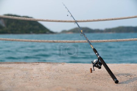 Foto de A fishing rod with sea background, fishing. - Imagen libre de derechos