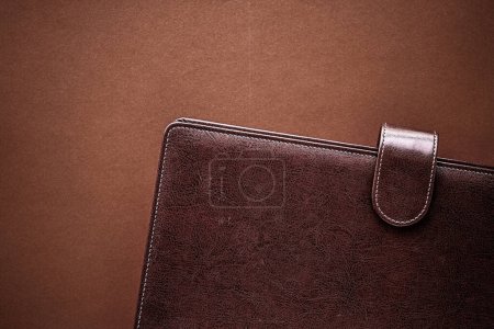Photo for Vintage business briefcase on the office table desk, flatlay background - Royalty Free Image