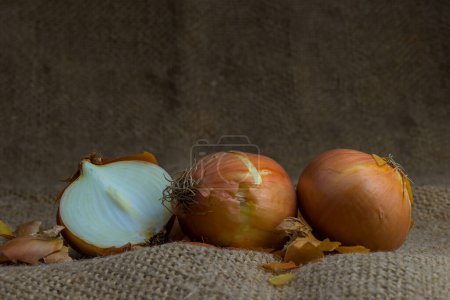 Photo for Close up view of unpeeled ripe onions - Royalty Free Image
