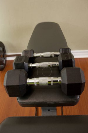 Photo for Closeup shot of dumbbells in a gym - Royalty Free Image