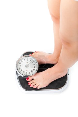 Photo for Young woman doing a weight loss. - Royalty Free Image