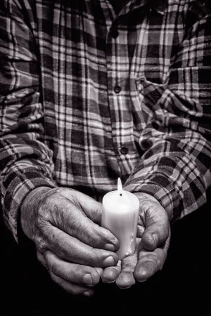 Photo for Senior man hands and candle close up - Royalty Free Image