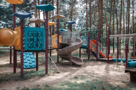 Photo for "A Playground for children in autumn Park." - Royalty Free Image