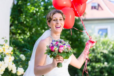 Téléchargez les photos : "Mariée au mariage avec des ballons d'hélium lus
" - en image libre de droit