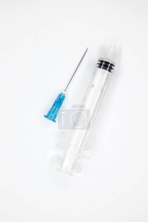 Photo for Syringe with needle  on white - Royalty Free Image