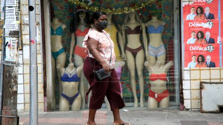 Photo for Fat woman wearing face mask in the street - Royalty Free Image