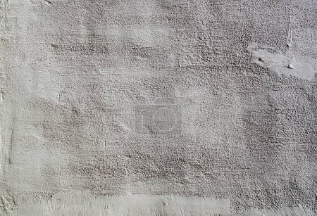 Photo for "Heavily textured white and grey external plastered wall" - Royalty Free Image