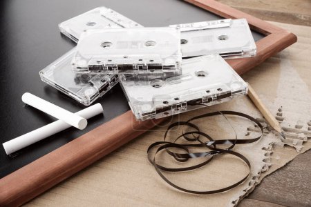Photo for Tape cassette on wooden table - Royalty Free Image
