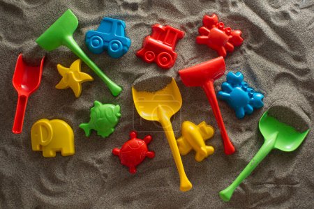 Photo for Top view of small beach games toys on sand - Royalty Free Image