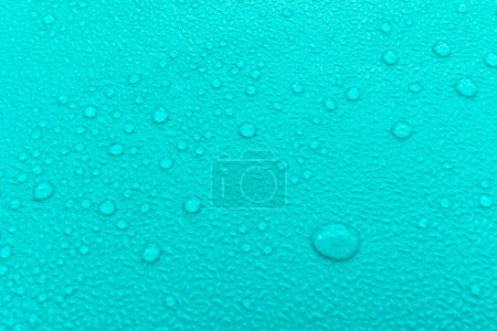 Foto de Gotas de agua sobre fondo azul - Imagen libre de derechos