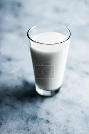 Photo for World Milk Day, full glass on marble table - Royalty Free Image