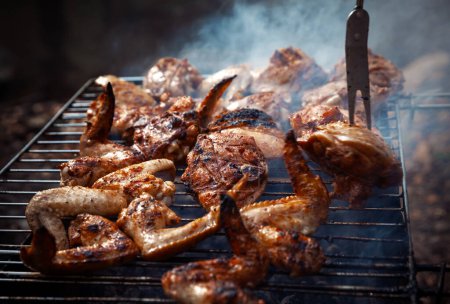 Photo for Grilling spiced chicken, close-up view - Royalty Free Image