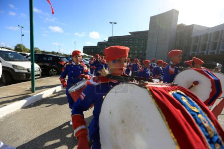Photo for Salvador, Bahia, Brazil - October 14, 2016: Members of the Bahia State Public School's fanfare are seen during a performance at the Centro Administrativo da Bahia in the city of Salvador. - Royalty Free Image