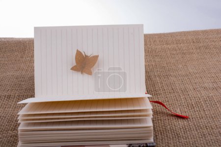 Photo for Paper cut out in shape of a butterfly - Royalty Free Image