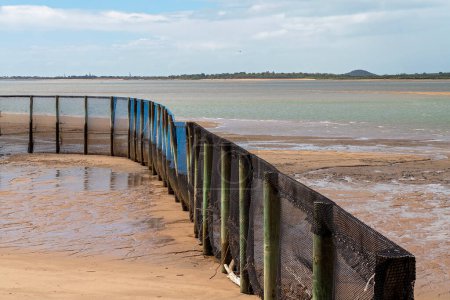 Photo for Safe Swimming Enclosure At Low Tide - Royalty Free Image