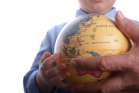 Foto de Bebé sosteniendo un globo - Imagen libre de derechos