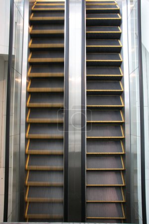 Photo for "Escalator up in the mall" - Royalty Free Image